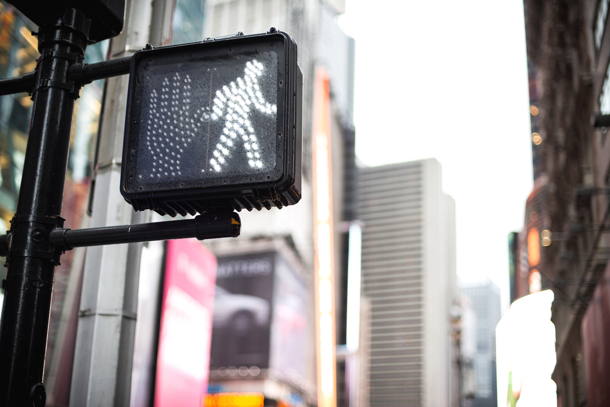 Crosswalk sign in a downtown city