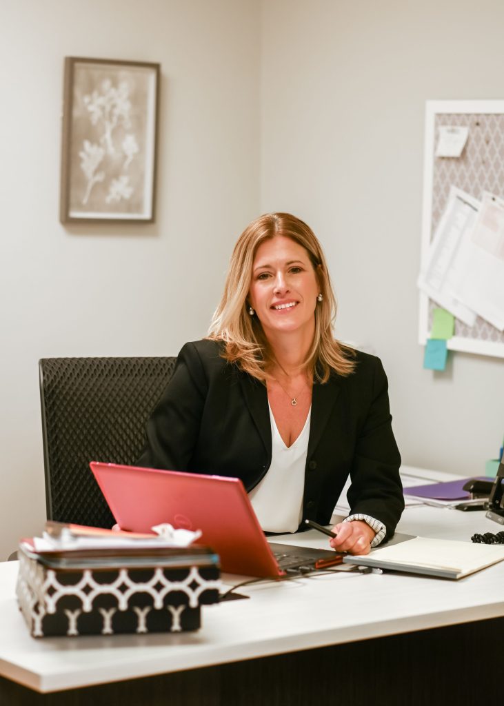 Personal Injury Attorney Leigh Raffauf at her desk