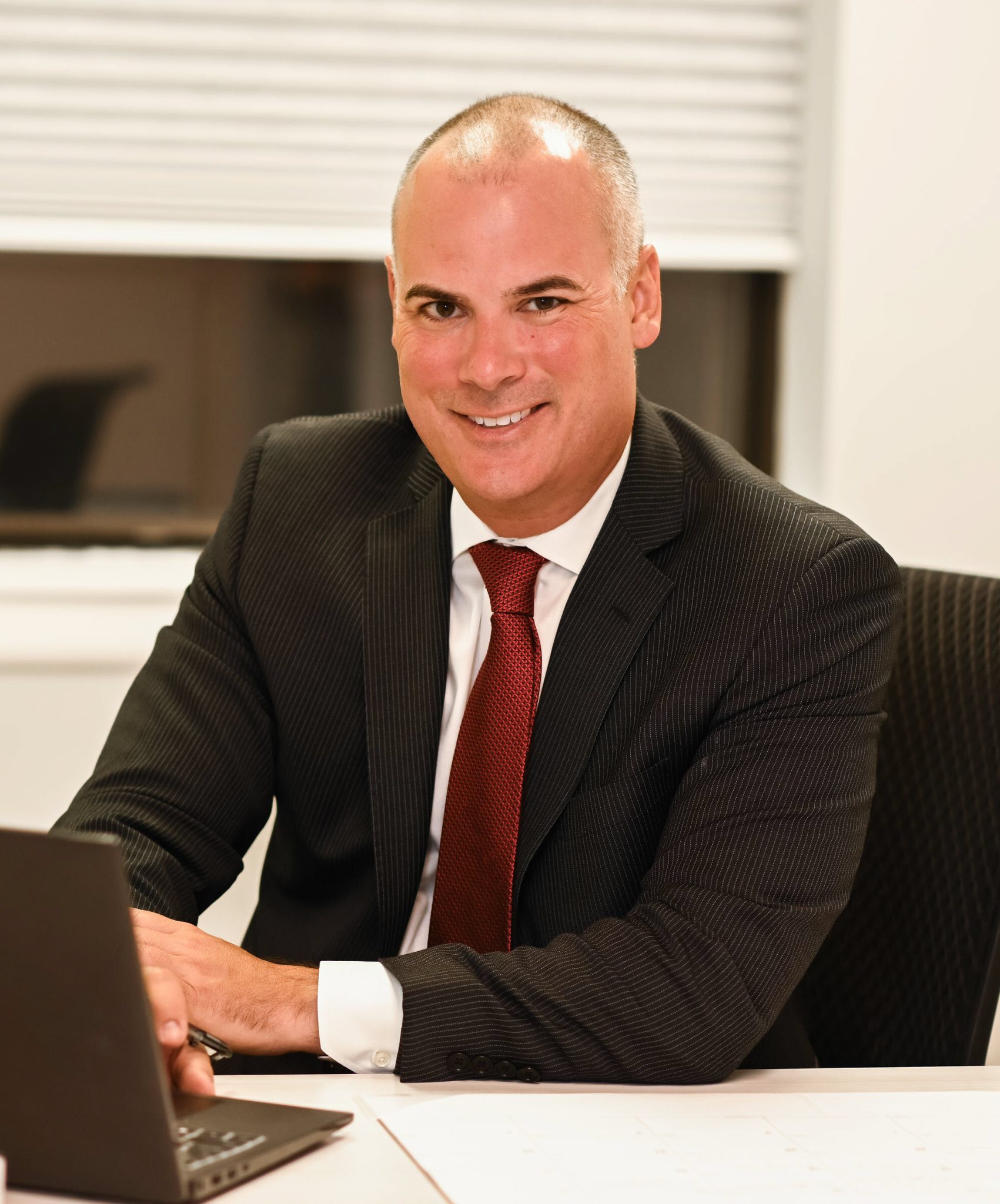 Personal Injury Lawyer Ken Harrell at his desk