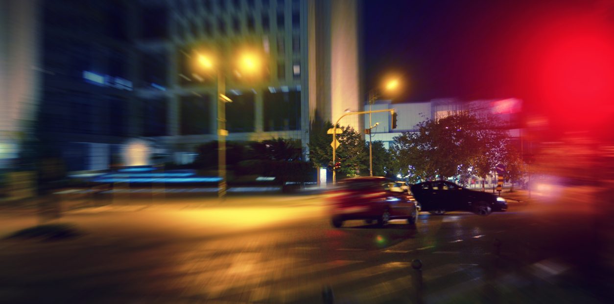Car accident. Car running through red light on the intersection and hitting another car. Car accident. Car running through red light on the intersection and hitting another car.