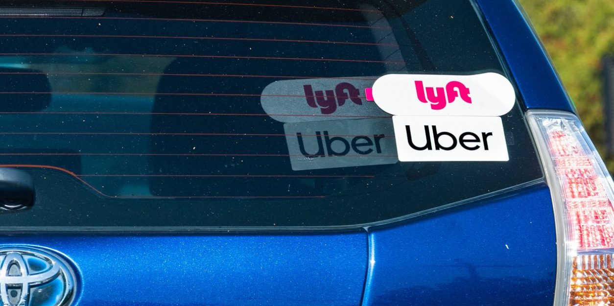 Vehicle offering rides for UBER and LYFT Oct 10, 2019 Mountain View / CA / USA - Toyota Prius Hybrid vehicle offering rides for UBER and LYFT in San Francisco Bay Area