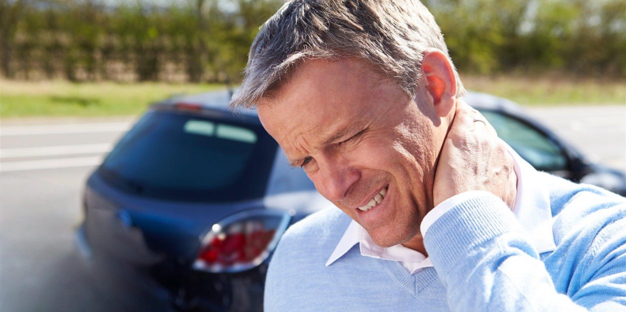 Man with neck injury after car accident Man with neck injury after car accident