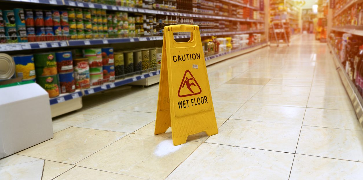 Grocery store slip and fall accident sign.